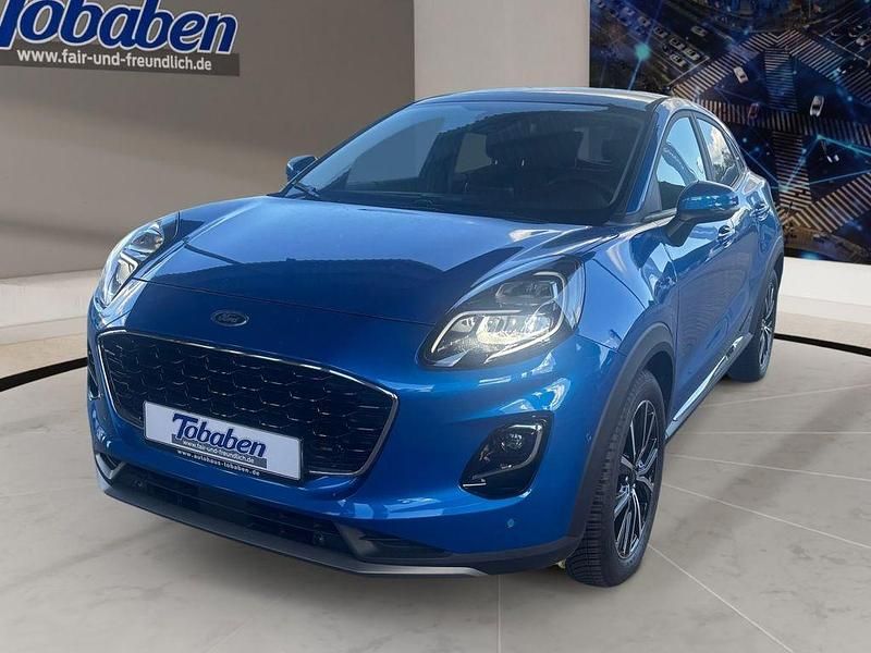 Desert island blue metallic Gebraucht 2023 Ford Puma Gen-E Titanium X SUV | 22.290 € (Fairer Preis) - Bild 1/4