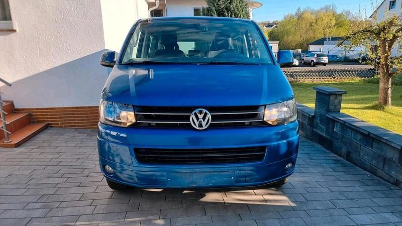 Second-hand VW T5 140 CP (102 kW) 2014 Albastru Van