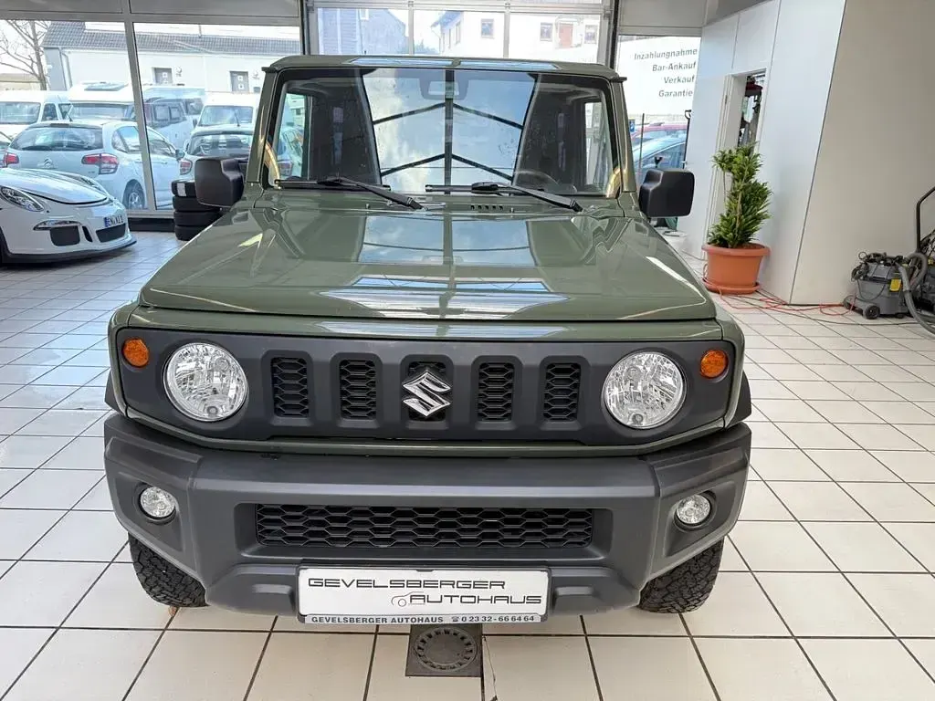 Gebraucht Suzuki Jimny Comfort 103 PS (75 kW) 2019 Solid jungle green SUV