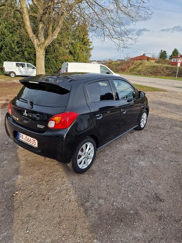 Second-hand Mitsubishi Space Star Top 80 CP (58 kW) 2014 Negru Monovolum