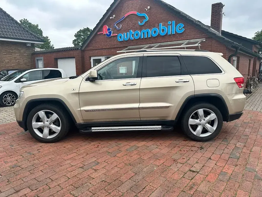 Gebraucht Jeep Grand Cherokee Overland 241 PS (177 kW) 2011 Gelb SUV