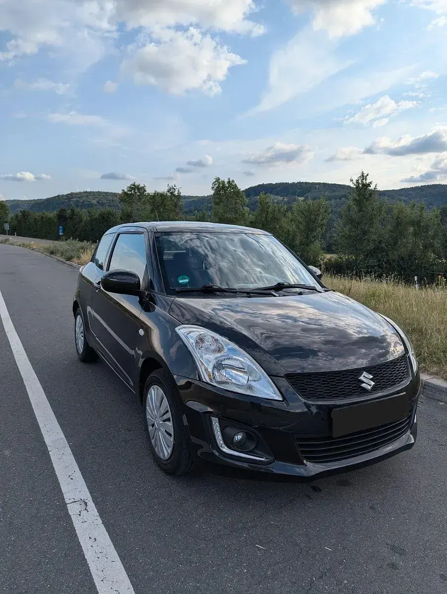 Gebraucht Suzuki Swift Club 94 PS (69 kW) 2015 Schwarz Kleinwagen