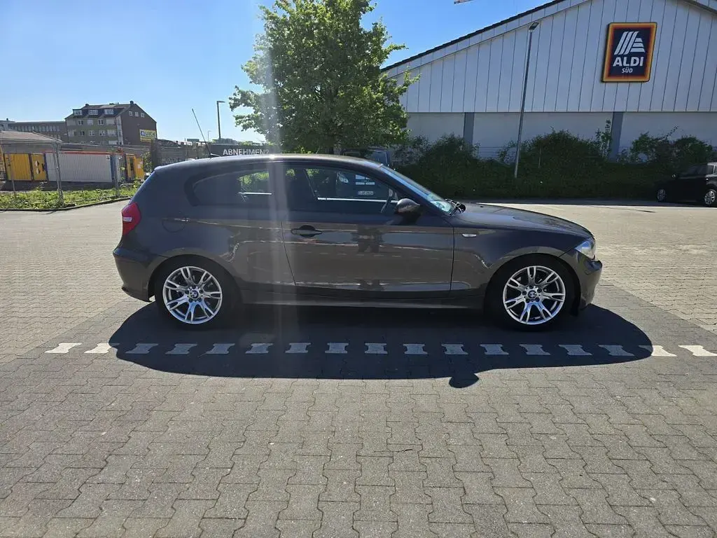 Używany BMW 116 Performance 122 KM (89 kW) 2009 Brązowy Hatchback