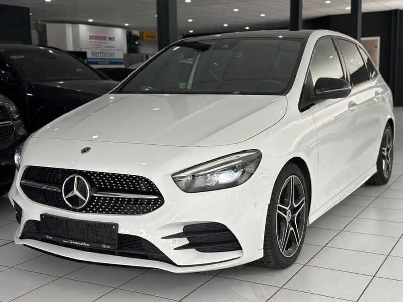 Digitalweiss metalliclack Gebraucht 2020 Mercedes B200 AMG line Van / Kleinbus | 24.900 € (Fairer Preis) - Bild 1/4