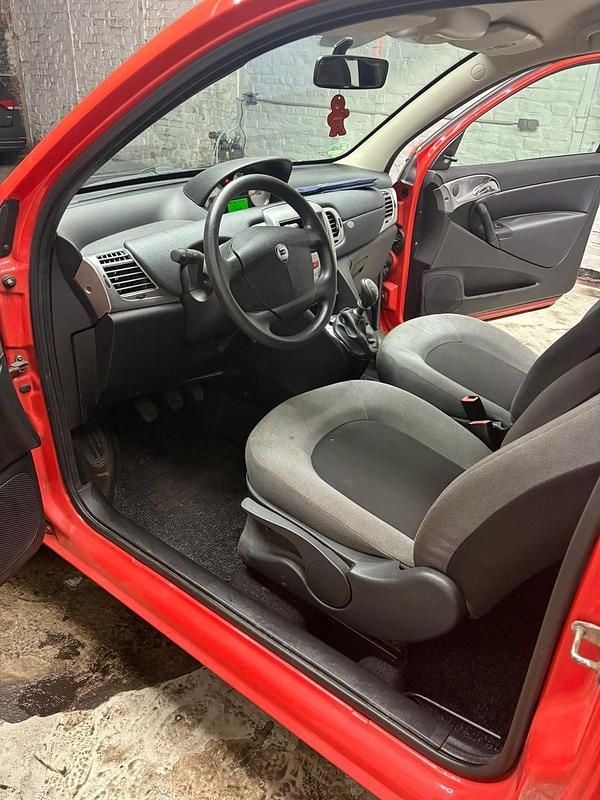 Second-hand Lancia Ypsilon 60 CP (44 kW) 2006 Portocaliu Hatchback