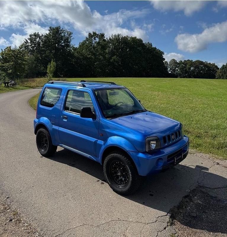 Blau Gebraucht 2001 Suzuki Jimny SUV | 7.790 € (Etwas zu teuer) - Bild 1/4