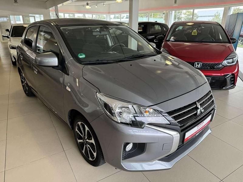 Grau Gebraucht 2023 Mitsubishi Space Star Select+ Kleinwagen | 13.990 € (Fairer Preis) - Bild 1/4