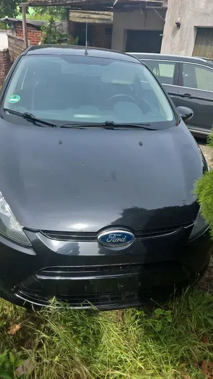 Gebraucht Ford Fiesta 82 PS (60 kW) 2012 Schwarz Limousine