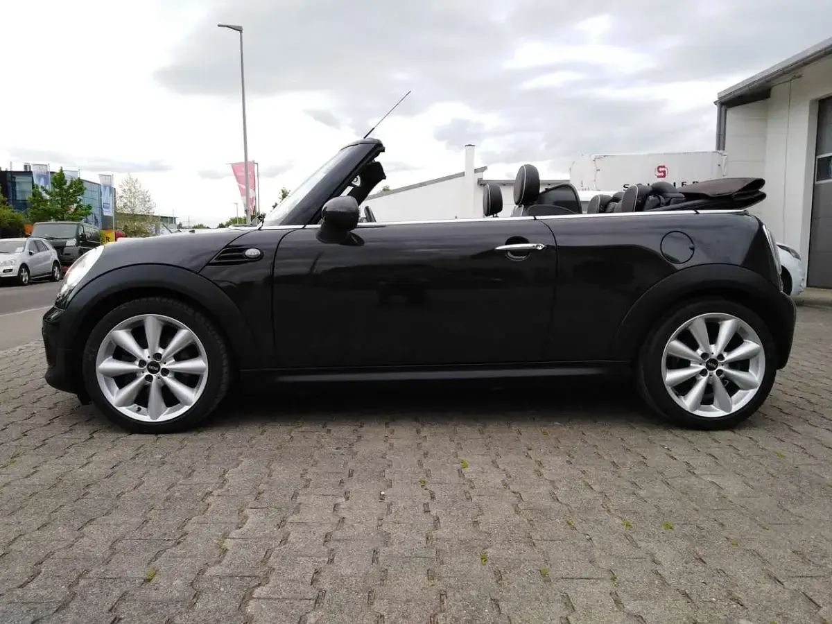 Gebraucht Mini Cooper Cabriolet 122 PS (89 kW) 2013 Iced chocolate metallic Cabrio