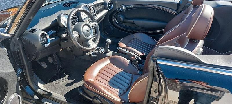 Gebraucht Mini Cooper Cabriolet 122 PS (89 kW) 2011 Schwarz Cabrio