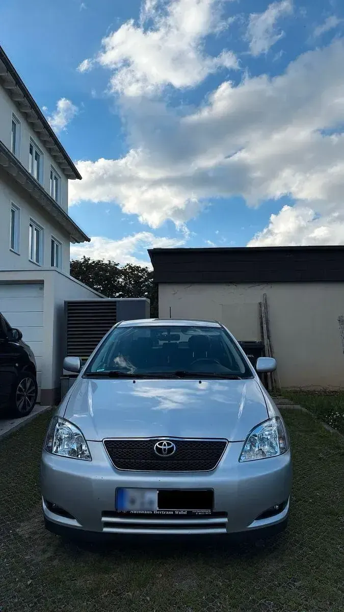 Używany Toyota Corolla 97 KM (71 kW) 2004 Srebrny Hatchback