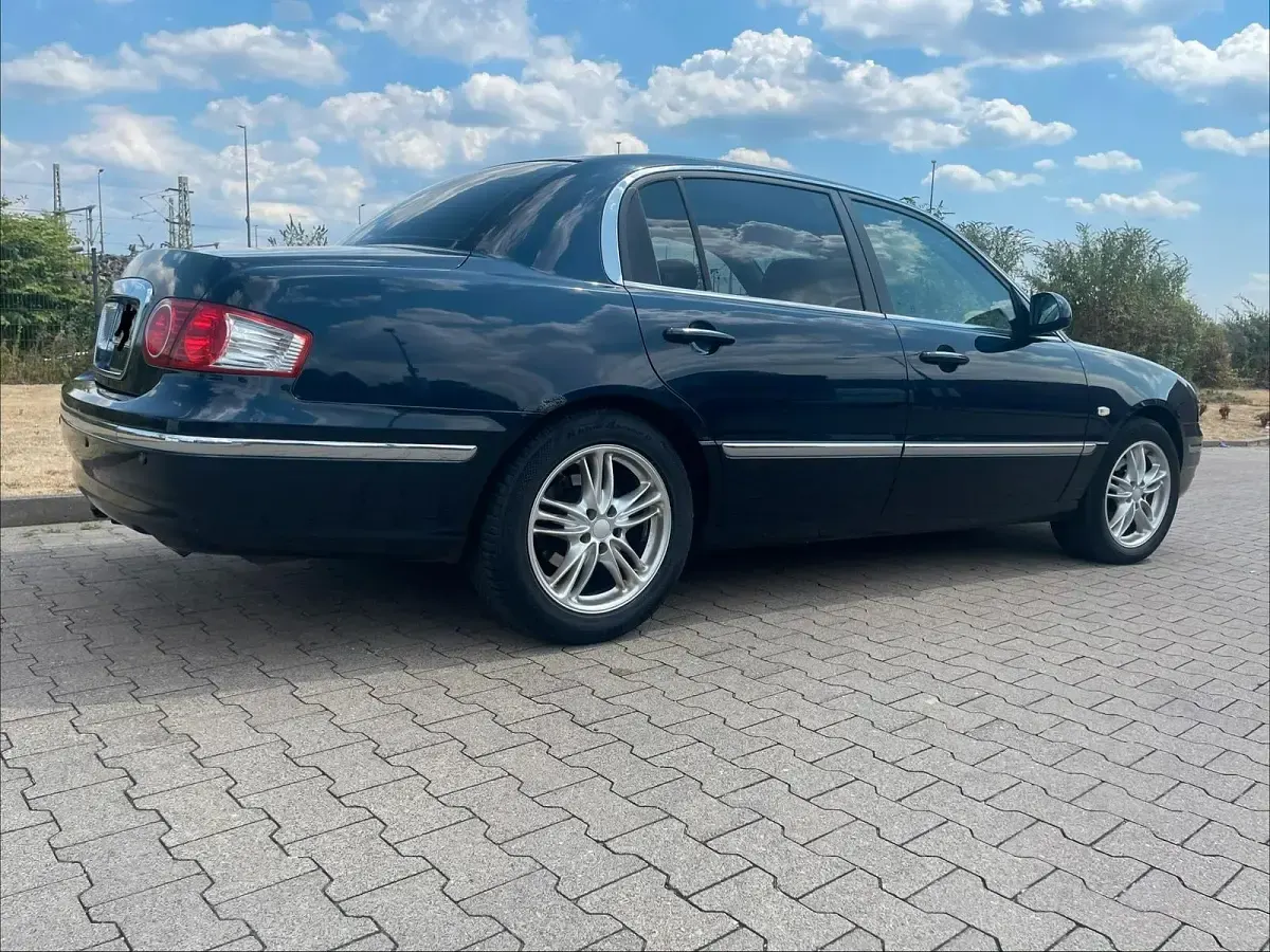 Gebraucht Kia Opirus 203 PS (149 kW) 2006 Blau Limousine