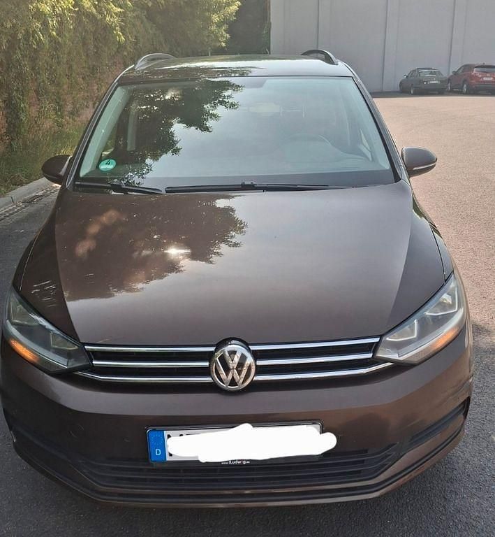 Braun Gebraucht 2015 VW Touran Comfortline Van / Kleinbus | 12.700 € (Fairer Preis) - Bild 1/4