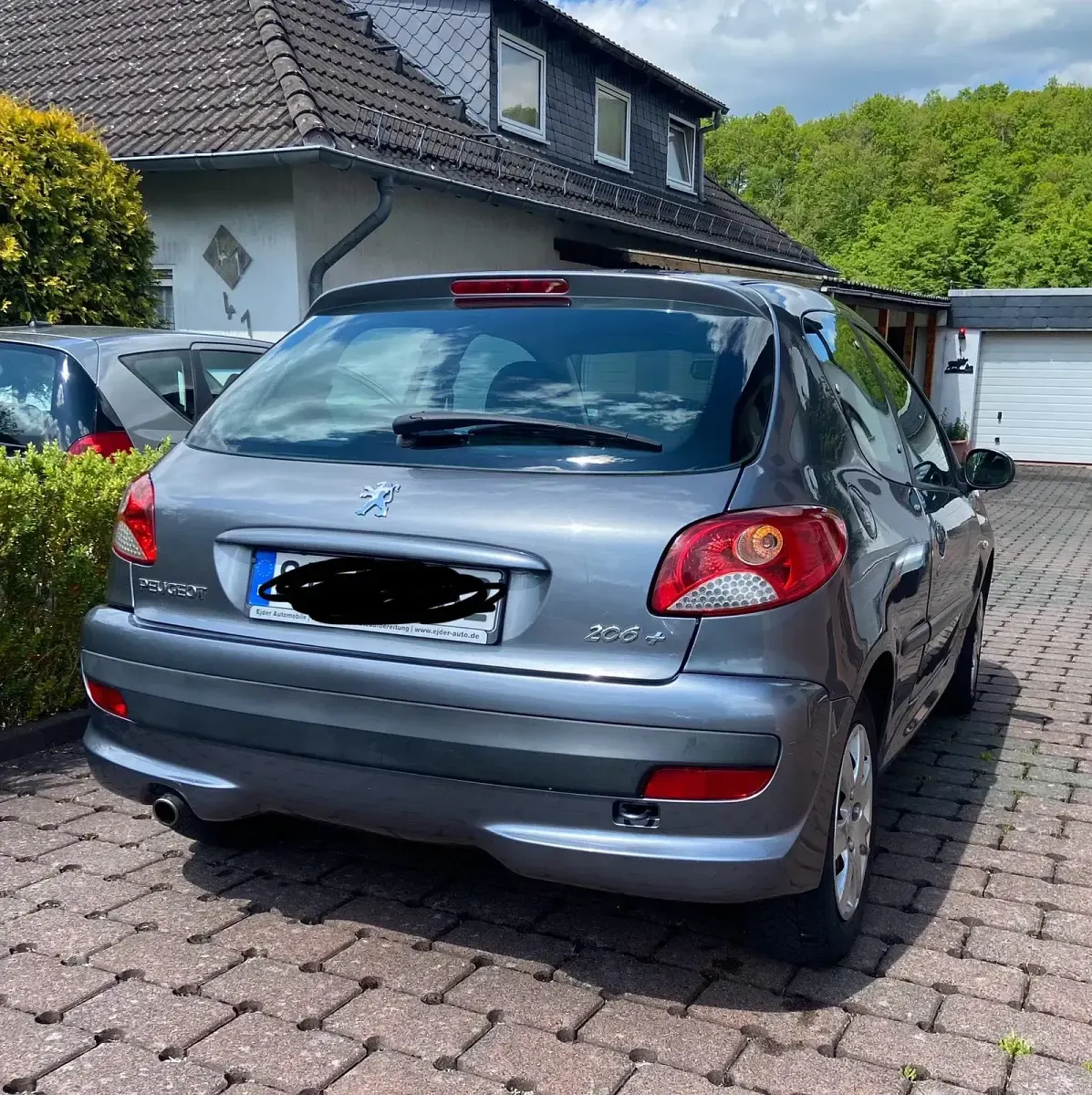 Gebraucht Peugeot 206+ 75 PS (55 kW) 2010 Grau Kleinwagen