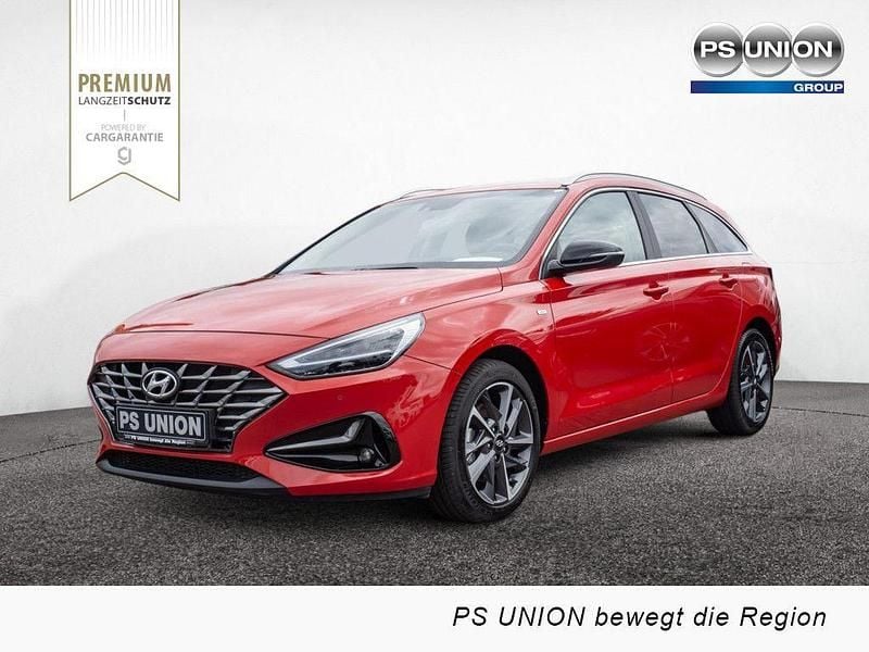 Rot / engine red Gebraucht 2022 Hyundai i30 Prime Kombi | 22.220 € (Fairer Preis) - Bild 1/4