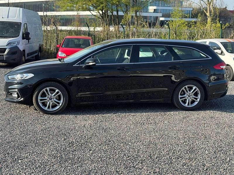 Gebraucht Ford Mondeo Titanium 150 PS (110 kW) 2019 Iridiumschwarz metallic Kombi