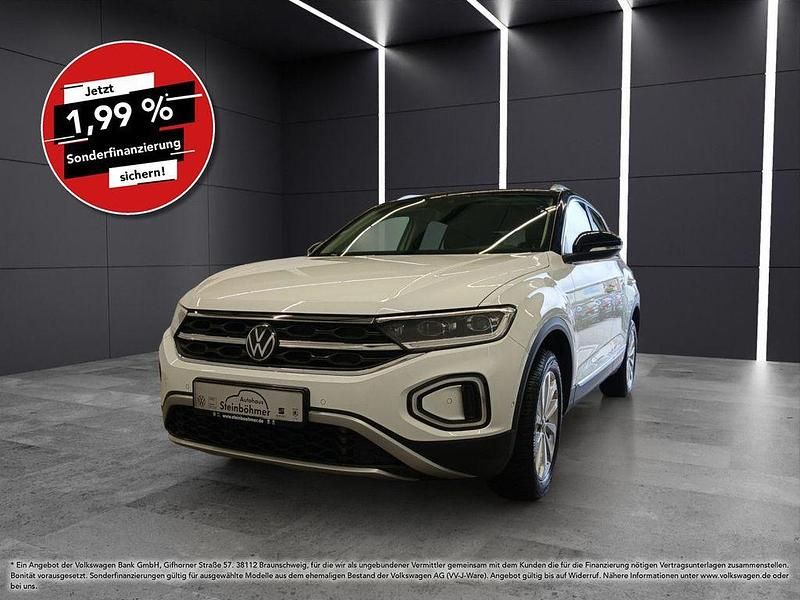 Pure white (weiß) Gebraucht 2024 VW T-Roc Style SUV | 28.745 € (Fairer Preis) - Bild 1/4
