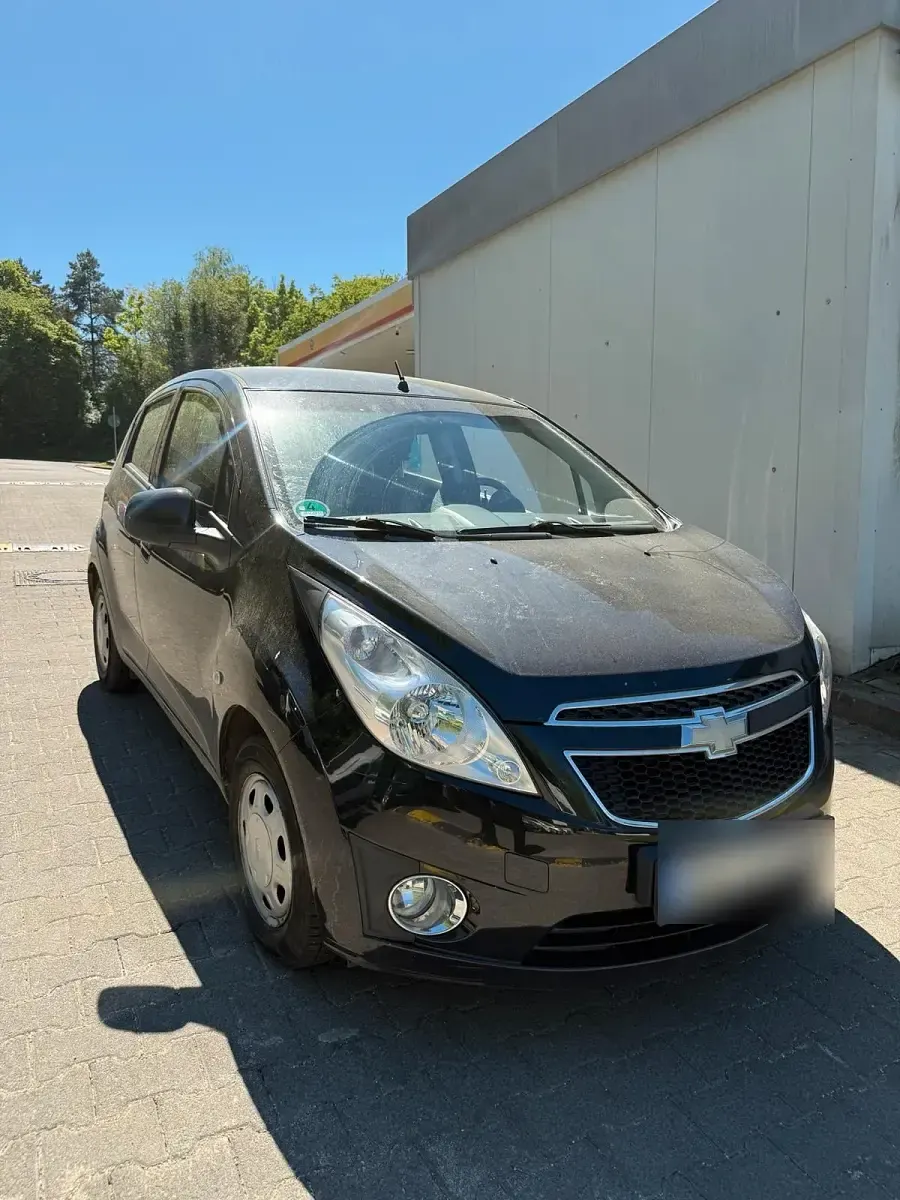 Second-hand Chevrolet Spark 68 CP (50 kW) 2012 Negru Hatchback