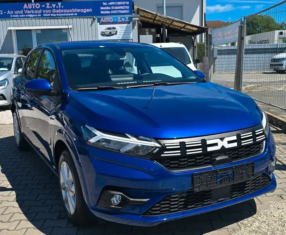 Gebraucht Dacia Sandero Expression 91 PS (66 kW) 2024 Blau Limousine