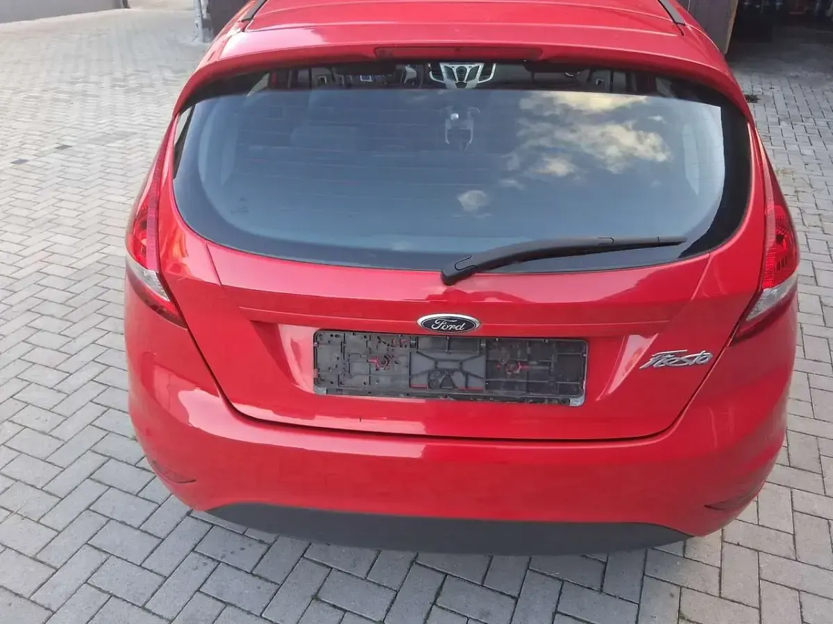 Gebraucht Ford Fiesta Ambiente 60 PS (44 kW) 2012 Rot Limousine