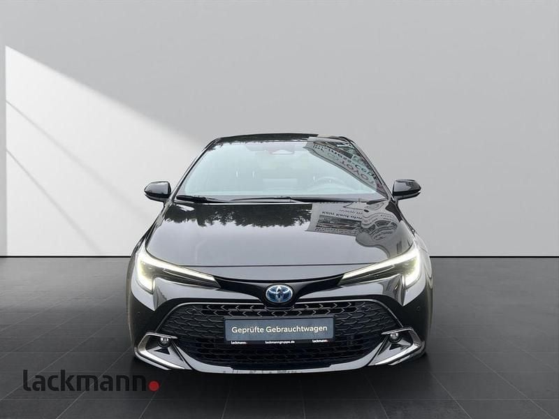 Gebraucht Toyota Corolla Hybrid Team 140 PS (102 kW) 2024 Night time black Limousine
