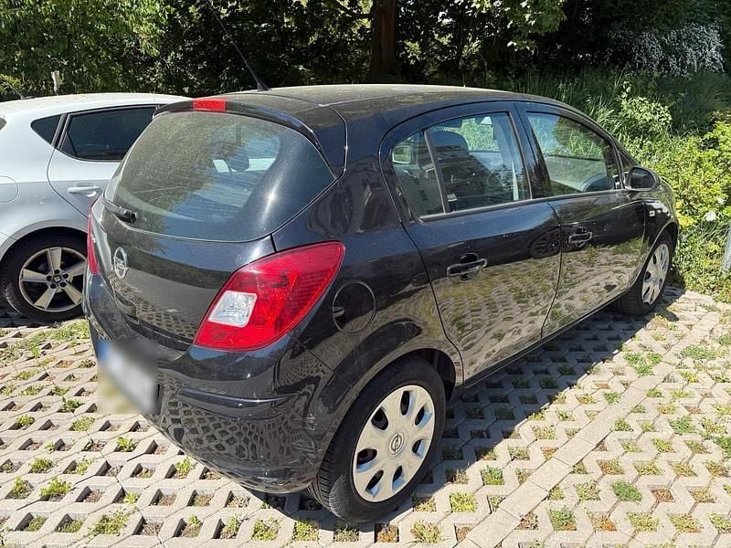 Second-hand Opel Corsa 86 CP (63 kW) 2011 Negru Hatchback