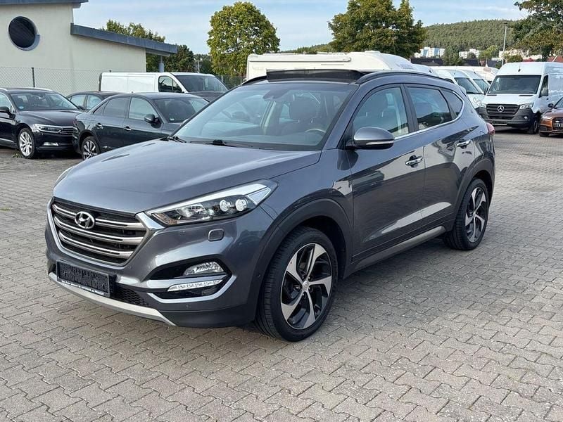 Grau Gebraucht 2017 Hyundai Tucson Premium SUV | 13.400 € (Guter Preis) - Bild 1/4