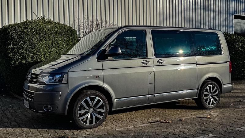 Grau Gebraucht 2014 VW Multivan Highline Van | 27.999 € (Superpreis) - Bild 1/2