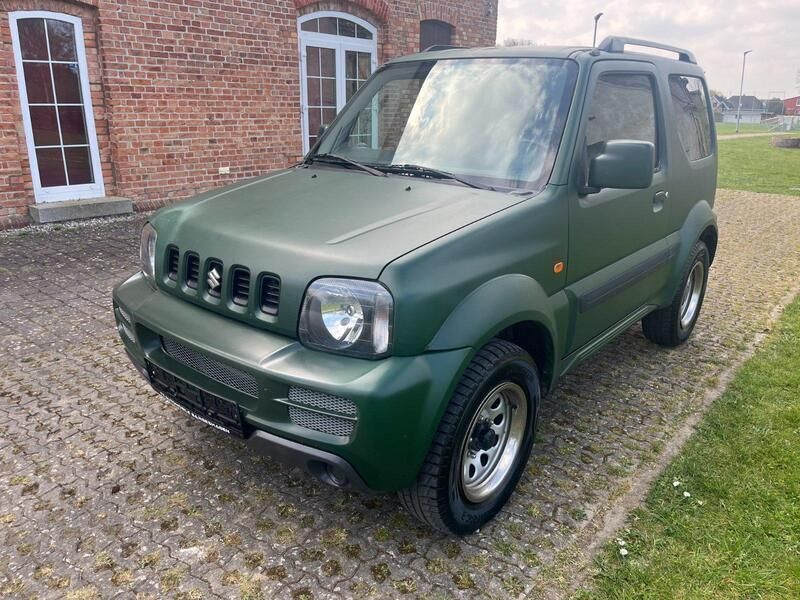 Grün Gebraucht 2012 Suzuki Jimny Ranger SUV | 12.490 € (Etwas zu teuer) - Bild 1/4
