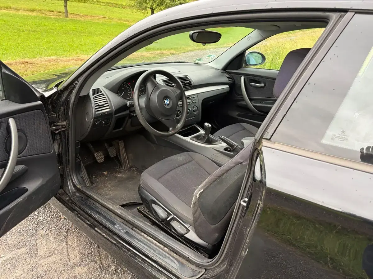 Gebraucht BMW 116 122 PS (89 kW) 2007 Schwarz Kleinwagen