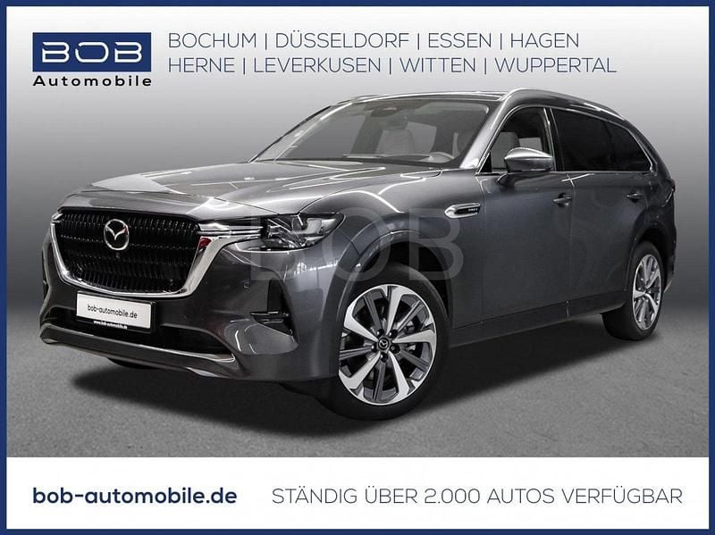 Machine gray Gebraucht 2024 Mazda CX-80 Takumi-Line SUV | 49.777 € (Superpreis) - Bild 1/3