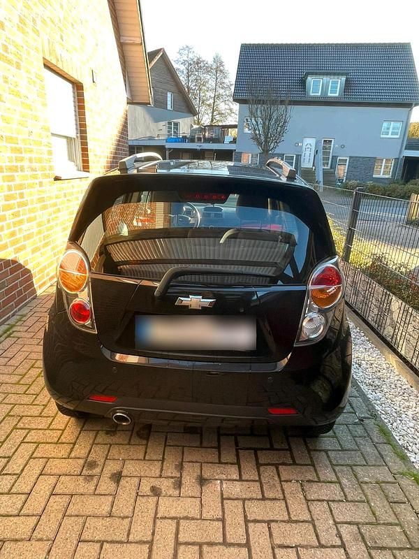 Gebraucht Chevrolet Spark 82 PS (60 kW) 2012 Schwarz Kleinwagen