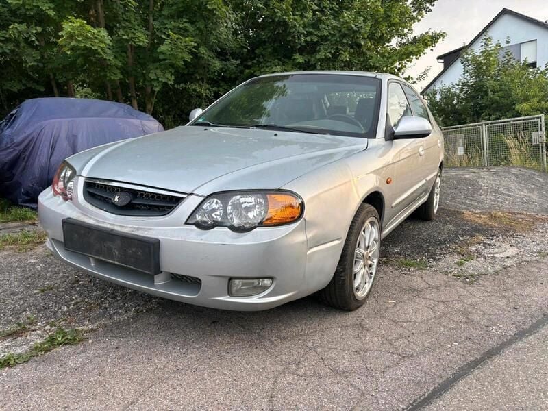 Silber Gebraucht 2002 Kia Shuma 2 Limousine | 1.499 € - Bild 1/4