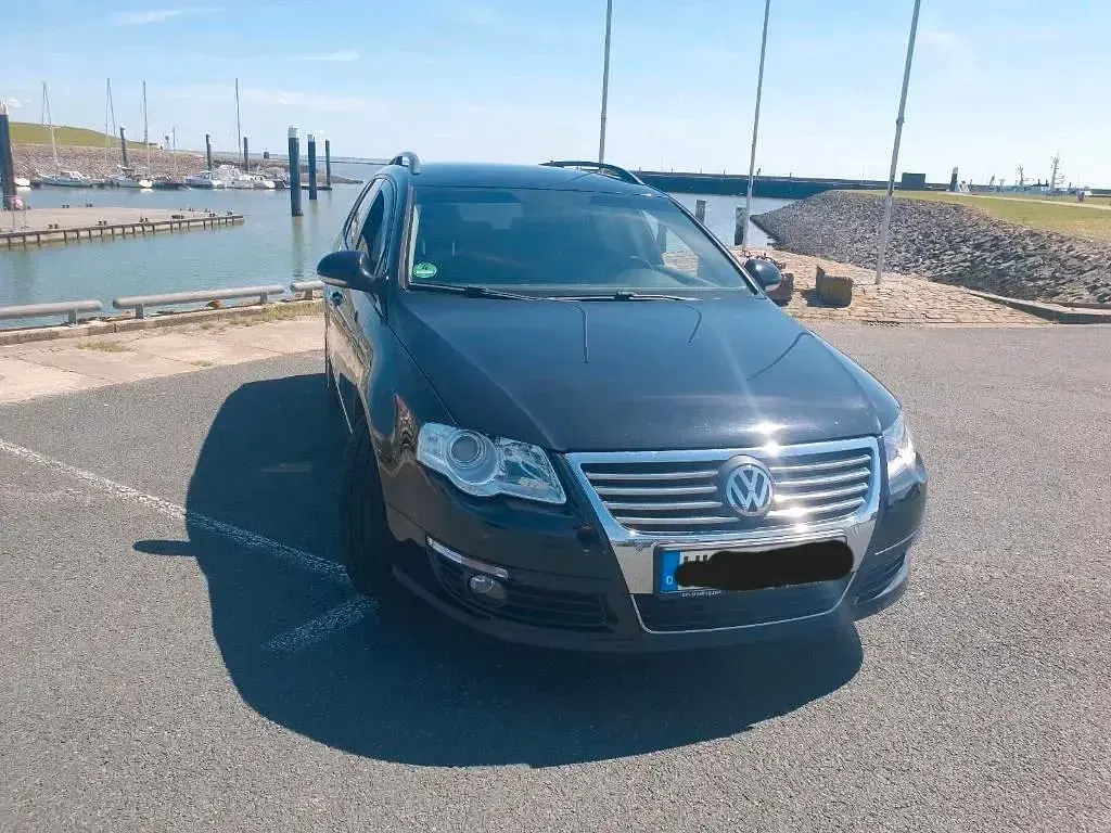 Second-hand VW Passat Sportline 160 CP (117 kW) 2009 Negru Break