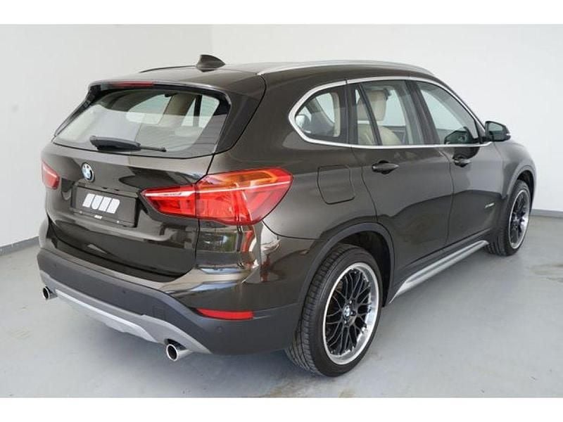 Używany BMW X1 190 KM (139 kW) 2017 Zielony SUV