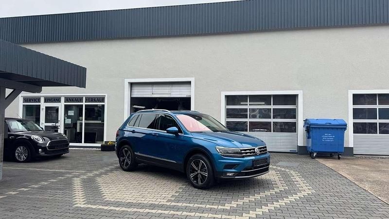 Caribbean blue metallic Gebraucht 2017 VW Tiguan Highline SUV | 20.990 € (Fairer Preis) - Bild 1/4