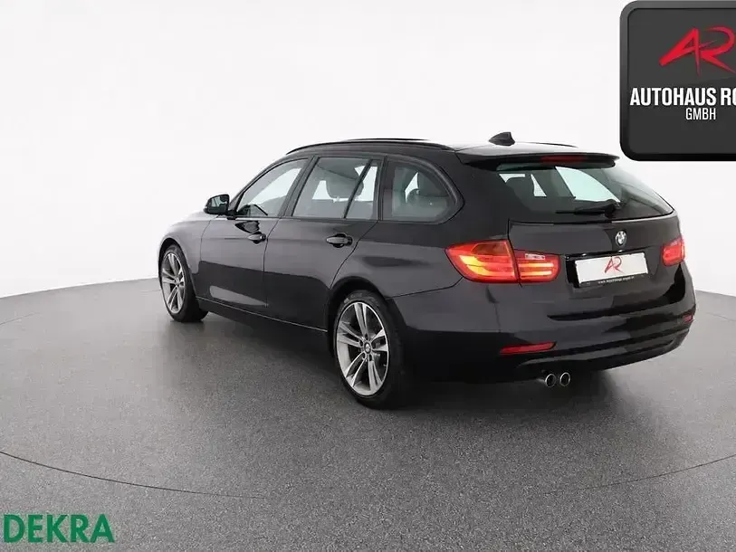 Gebraucht BMW 330 Comfort Edition 258 PS (189 kW) 2014 Black sapphire Kombi