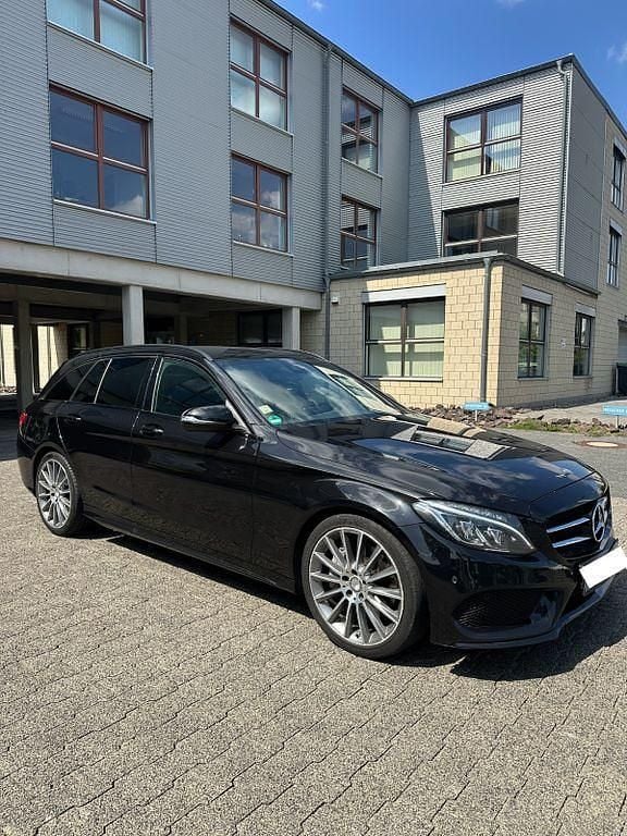 Schwarz Gebraucht 2016 Mercedes C250 AMG line Limousine | 17.500 € (Guter Preis) - Bild 1/4