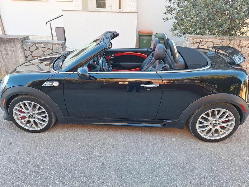 Schwarz Gebraucht 2012 Mini John Cooper Works Cabriolet Cabrio | 20.000 € - Bild 1/4