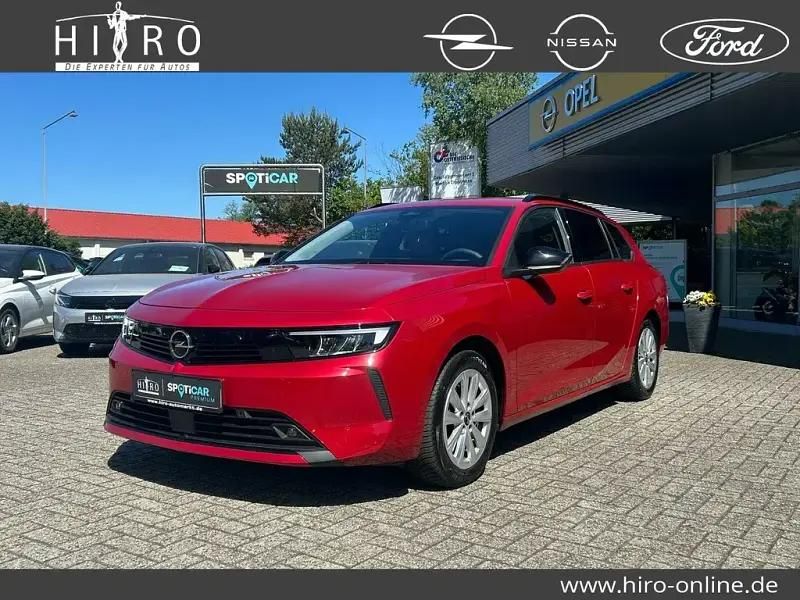 Chili rot Gebraucht 2024 Opel Astra Enjoy Kombi | 21.550 € (Fairer Preis) - Bild 1/4