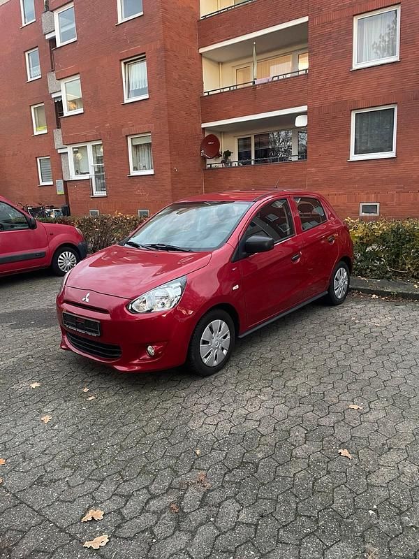 Rot Gebraucht 2015 Mitsubishi Space Star Kleinwagen | 3.400 € (Fairer Preis) - Bild 1/4