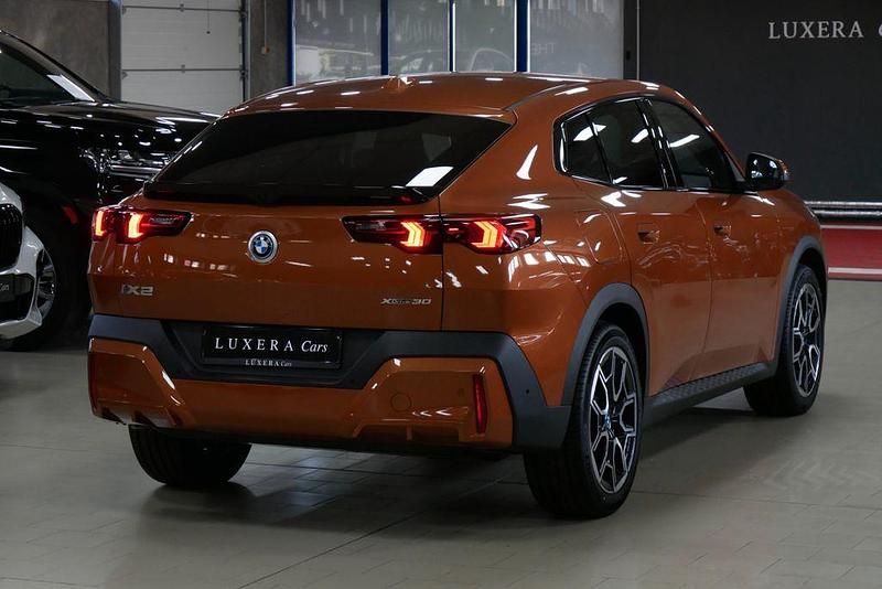 Gebraucht BMW iX2 Performance 230 kW (313 PS) 2025 Orange SUV