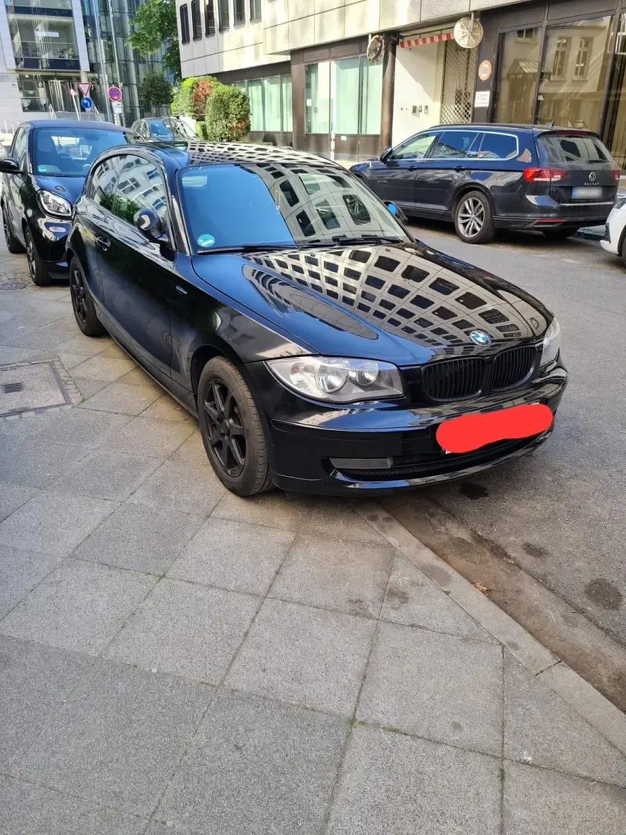 Gebraucht BMW 116 122 PS (89 kW) 2008 Schwarz Kleinwagen