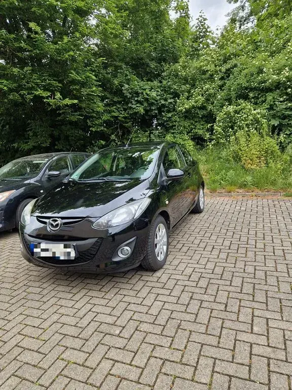 Gebraucht Mazda 2 Active 75 PS (55 kW) 2010 Schwarz Kleinwagen