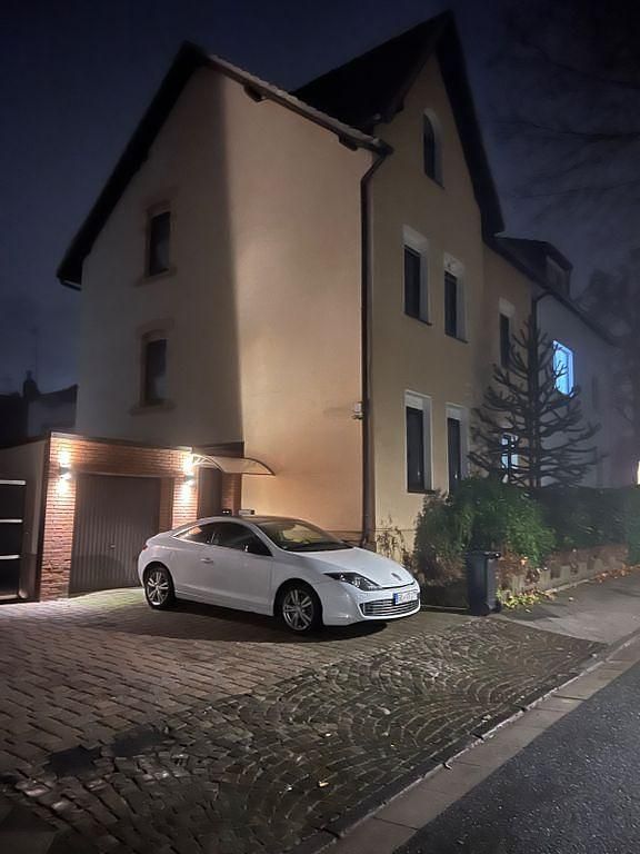 Gebraucht Renault Laguna III 150 PS (110 kW) 2012 Weiß Coupé