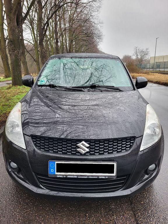 Gebraucht Suzuki Swift Comfort 94 PS (69 kW) 2013 Schwarz Kleinwagen