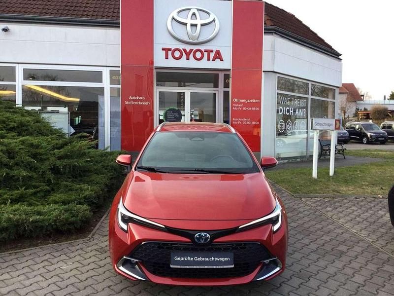 Gebraucht Toyota Corolla Team 196 PS (144 kW) 2023 Karminarot metallic Kombi