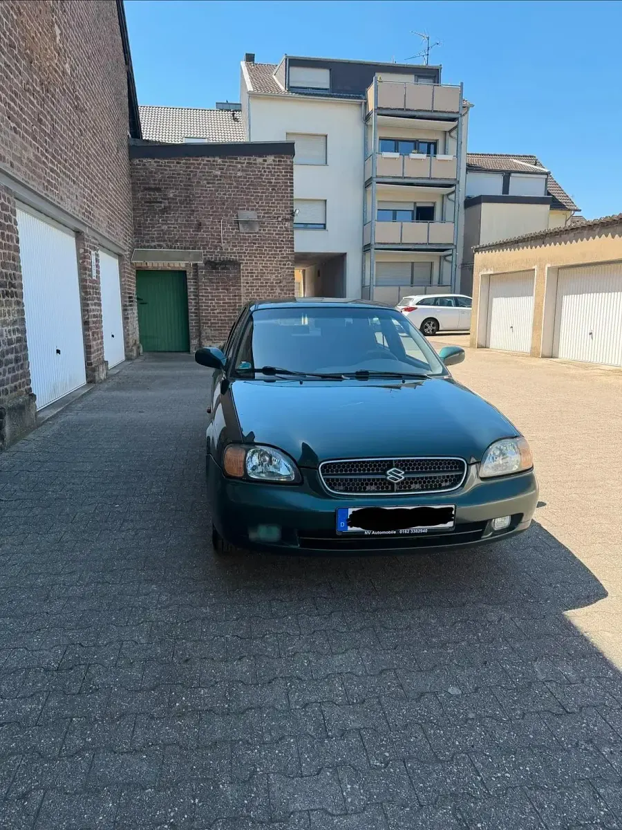 Gebraucht Suzuki Baleno 85 PS (62 kW) 2001 Grün Limousine