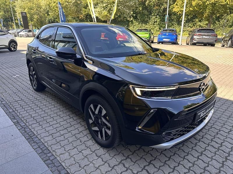 Gebraucht Opel Mokka-e Elegance 100 kW (136 PS) 2022 Karbon schwarz metallic SUV