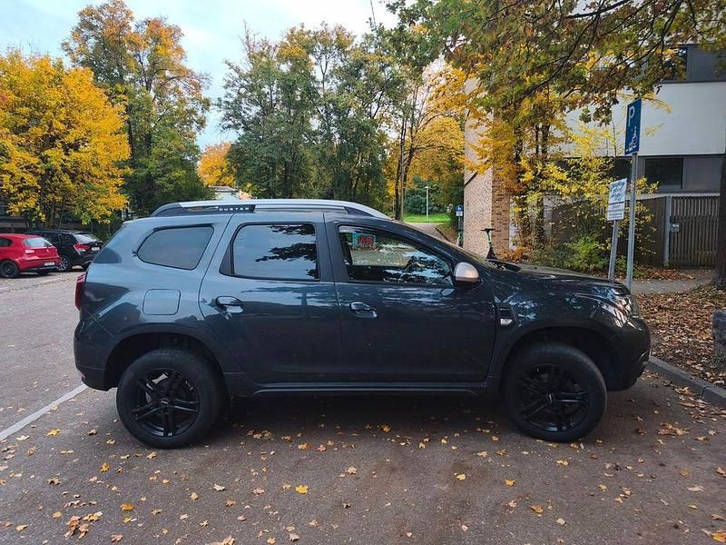 Grau Gebraucht 2021 Dacia Duster Comfort SUV | 19.200 € (Fairer Preis) - Bild 1/4